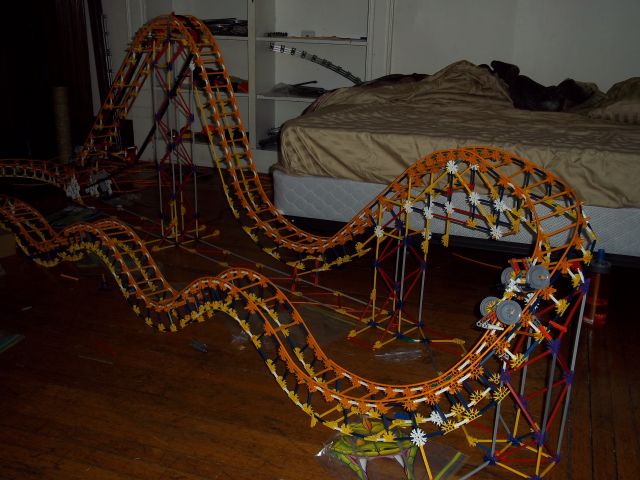 Wooden Original Roller Coaster - side view with curved drop